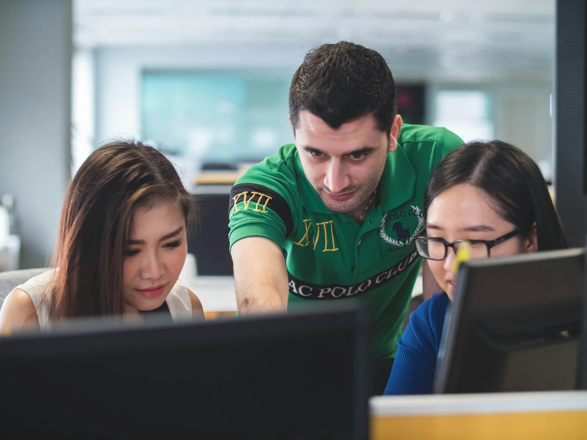 Students discussing A-Level subject choices and university plans in a modern classroom