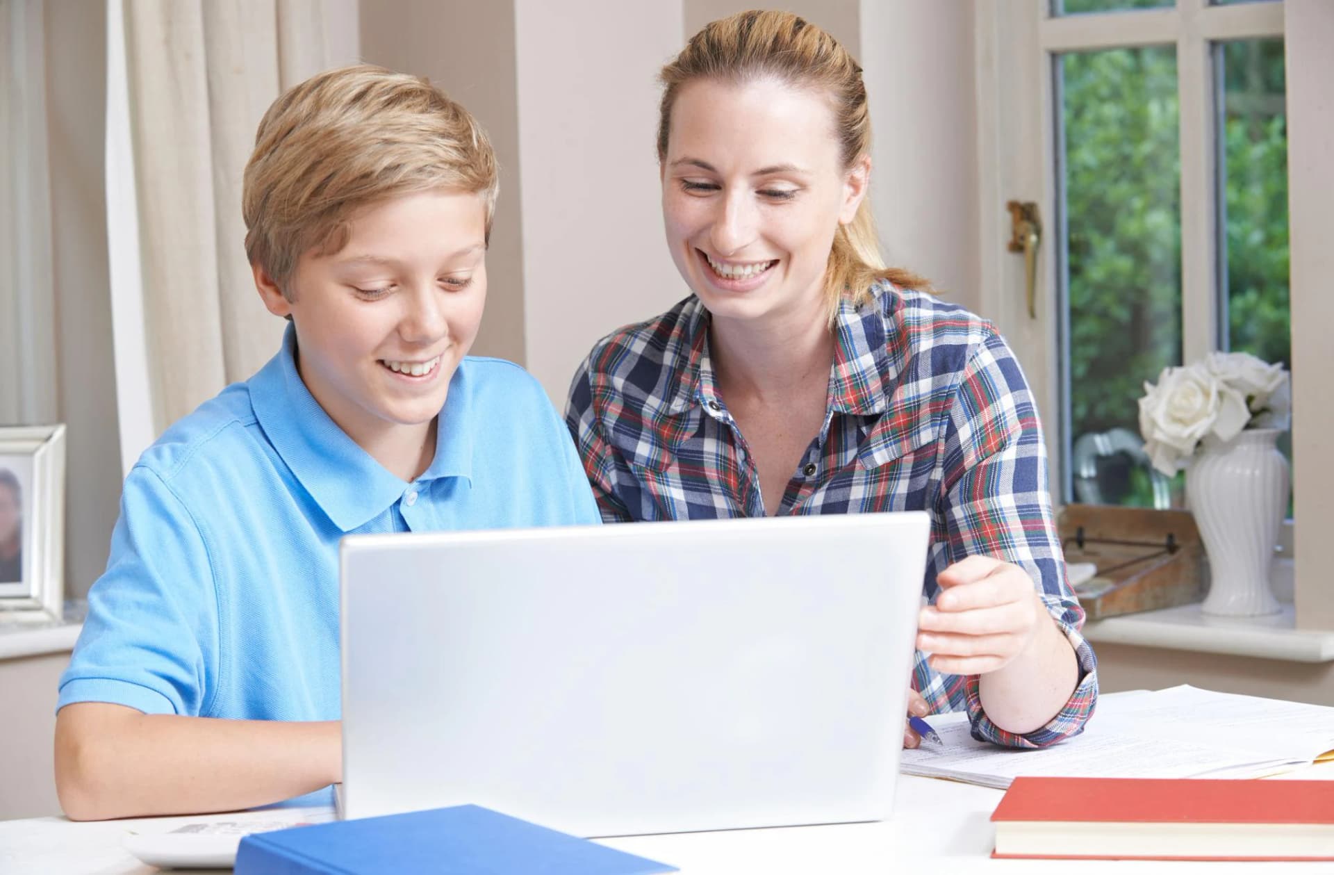 Parent and student in online tutoring session in Mishref